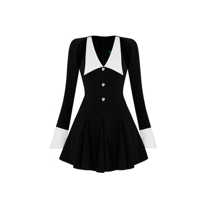 Black dress with white collar and leaf shape